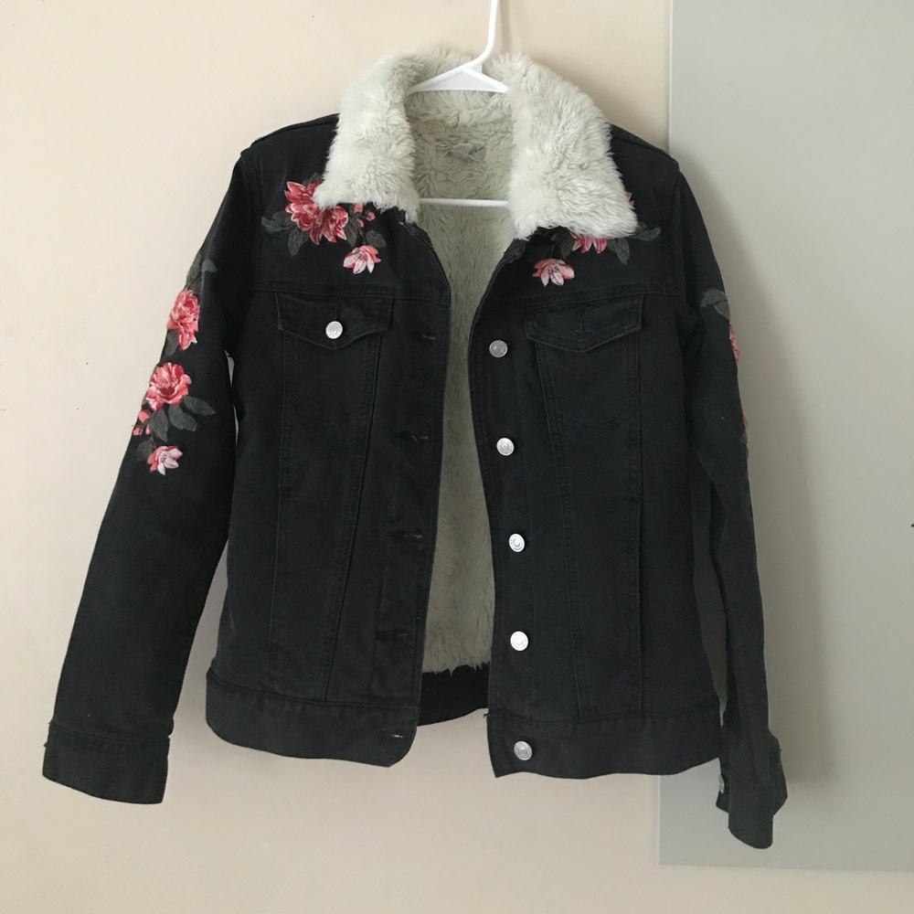 black jean jacket with rose designs